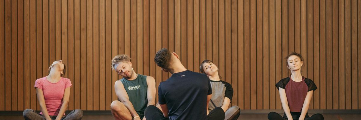 Wide view of a peaceful yoga studio environment